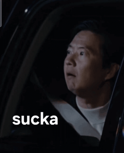 Man Sitting In Car With Sucka Behind Him GIF