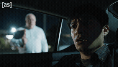 Man Sitting In Car With Word As GIF