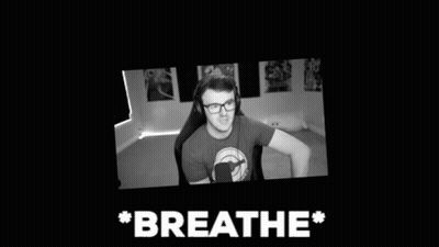 Man Sitting In Chair Black And White Breathe GIF