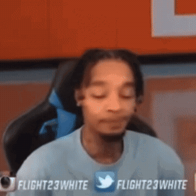 Man Sitting In Chair Eyes Closed Twitter Shirt GIF