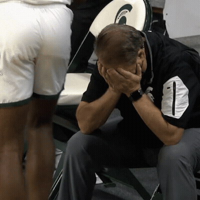 Man Sitting In Chair Hands On Face GIF