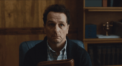 Man Sitting In Chair Holding Briefcase GIF