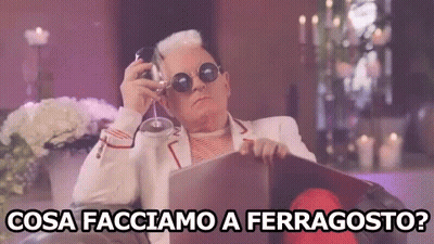 Man Sitting In Chair Holding Wine Cosa Facciamo A Ferragosto GIF