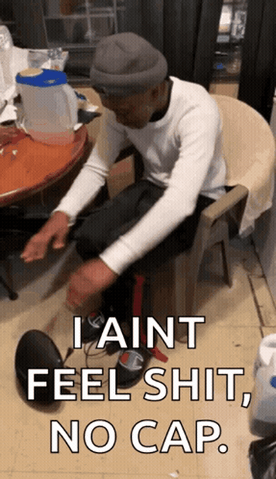 Man Sitting In Chair I Ain't Feel Shit No Cap GIF