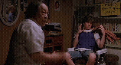 Man Sitting In Chair Next To Woman Saying You're Welcome GIF
