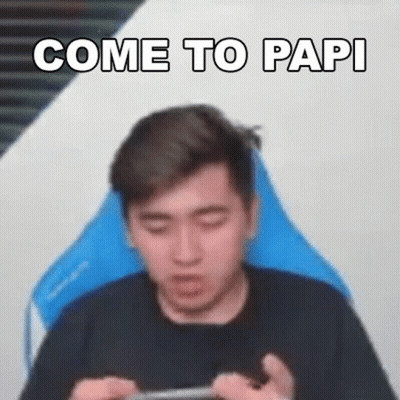 Man Sitting In Chair Playing Phone Saying Come To Papi GIF