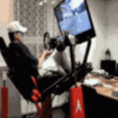 Man Sitting In Chair Playing Video Game GIF