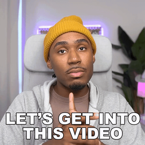 Man Sitting In Chair Saying Let's Get Into This Video GIF