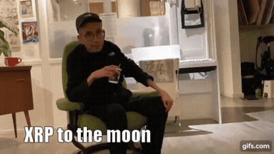 Man Sitting In Chair Saying XRP To The Moon GIF