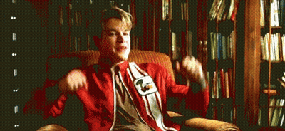 Man Sitting In Chair With Arms Up GIF