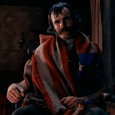 Man Sitting In Chair With Blanket GIF