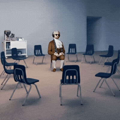 Man Sitting In Chair With Blue Chairs GIF