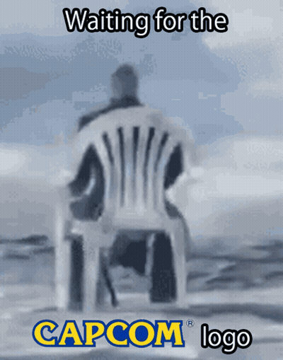 Man Sitting In Chair With Capcom Logo GIF