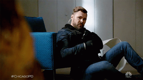 Man Sitting In Chair With Hashtag Chicagopd GIF