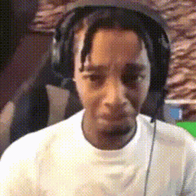 Man Sitting In Chair With Headphones GIF