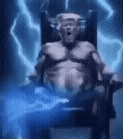 Man Sitting In Chair With Lightning Bolt In Chest GIF