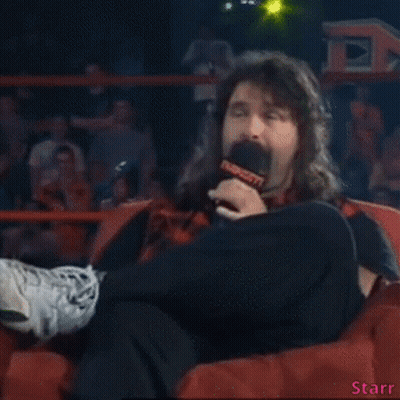 Man Sitting In Chair With Microphone Saying Starr GIF