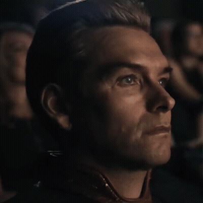 Man Sitting In Dark Room Looking Up GIF