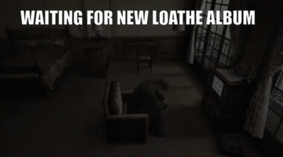 Man Sitting In Dark Room Waiting For Loathe Album GIF