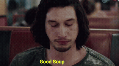 Man Sitting In Diner Eyes Closed Saying Good Soup GIF