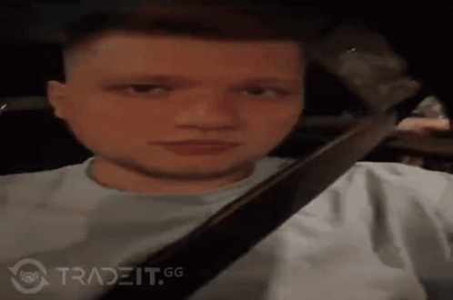 Man Sitting In Driver's Seat With Gun GIF