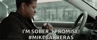 Man Sitting In Driver Seat Holding Cigarette GIF