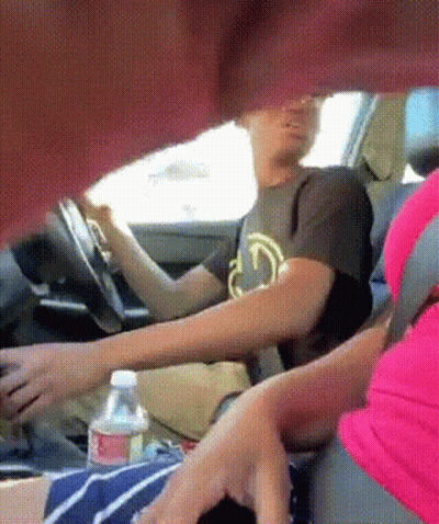 Man Sitting In Driver Seat With Fumato GIF