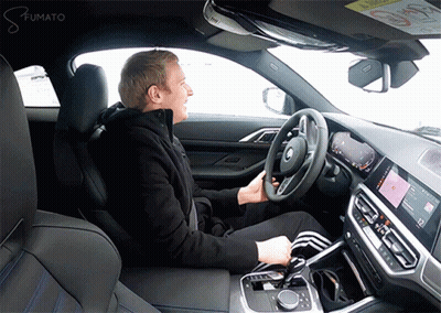Man Sitting In Drivers Seat With Fumato GIF