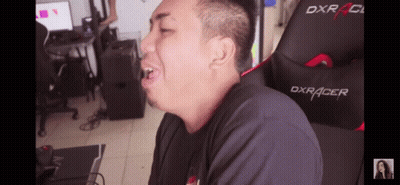Man Sitting In DXRacer Gaming Chair With Mouth Open GIF
