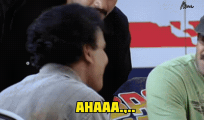 Man Sitting In Front Of Ahaa Sign GIF