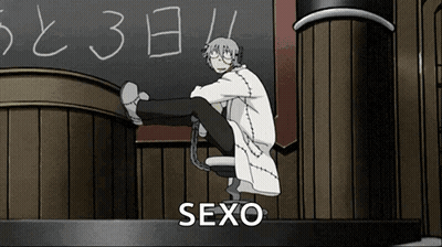 Man Sitting In Front Of Blackboard With Sexo GIF