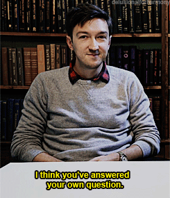 Man Sitting In Front Of Bookshelf Saying I Think Youve Answered Your Own Question GIF