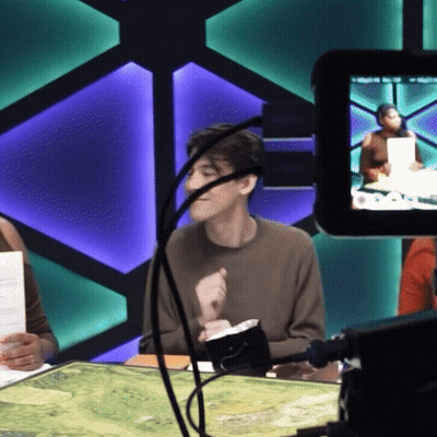 Man Sitting In Front Of Camera With Microphone GIF