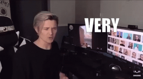 Man Sitting In Front Of Computer With Very GIF