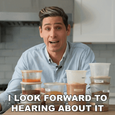 Man Sitting In Front Of Containers I Look Forward To Hearing About It GIF