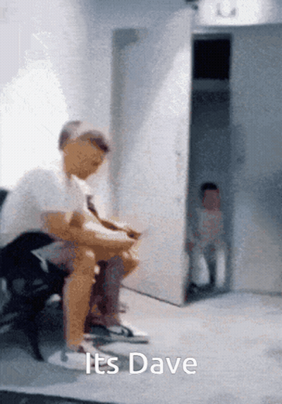 Man Sitting In Front Of Dave Door GIF