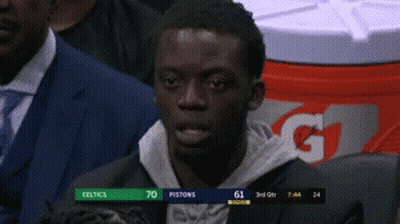 Man Sitting In Front Of Gatorade Cooler GIF