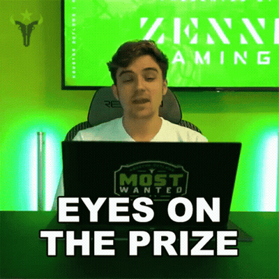 Man Sitting In Front Of Laptop Eyes On The Prize GIF