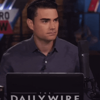 Man Sitting In Front Of Laptop With Daily Wire GIF