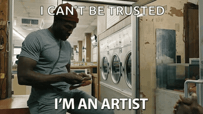 Man Sitting In Front Of Laundromat Saying I Can't Be Trusted GIF