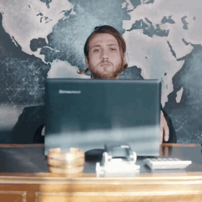 Man Sitting In Front Of Lenovo Computer Monitor GIF