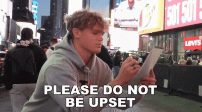 Man Sitting In Front Of Levi's Store GIF