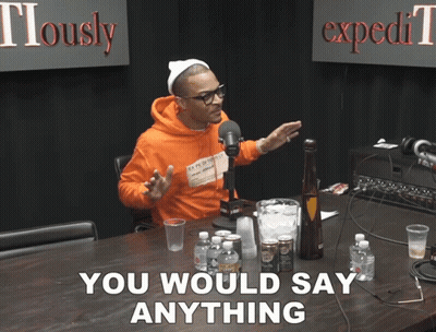 Man Sitting In Front Of Microphone Saying Anything GIF