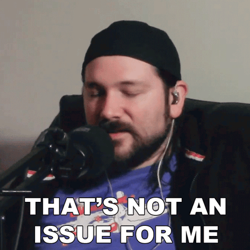 Man Sitting In Front Of Microphone Saying That's Not An Issue GIF