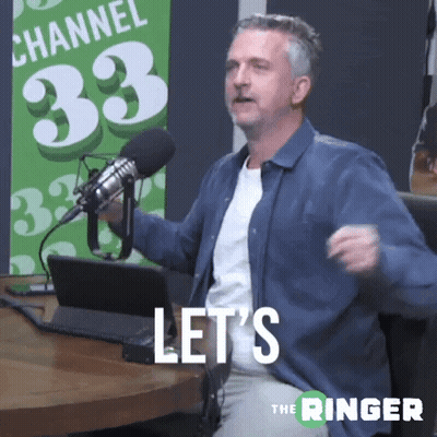 Man Sitting In Front Of Microphone GIF