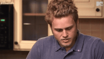 Man Sitting In Front Of Microwave GIF