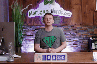 Man Sitting In Front Of Mortgage Nerds Sign GIF