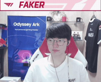 Man Sitting In Front Of Odyssey Ark Sign GIF