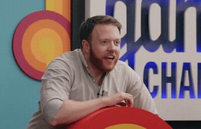 Man Sitting In Front Of Plain Chat Sign GIF