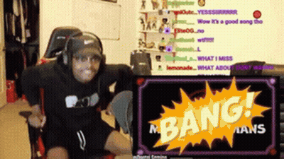 Man Sitting In Front Of Screen Saying Bang GIF